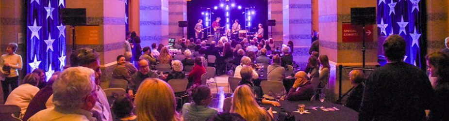 People listening to a band perform at the Minnesota History Center.