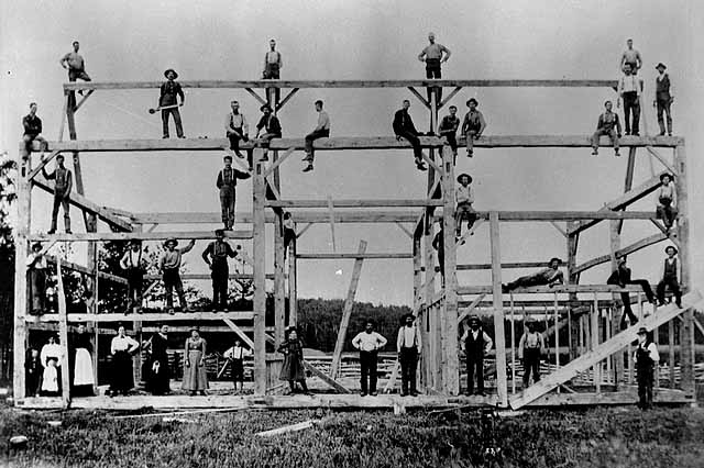 Photo of the lumber frame of a large barn from the Rainy River district, 1900.